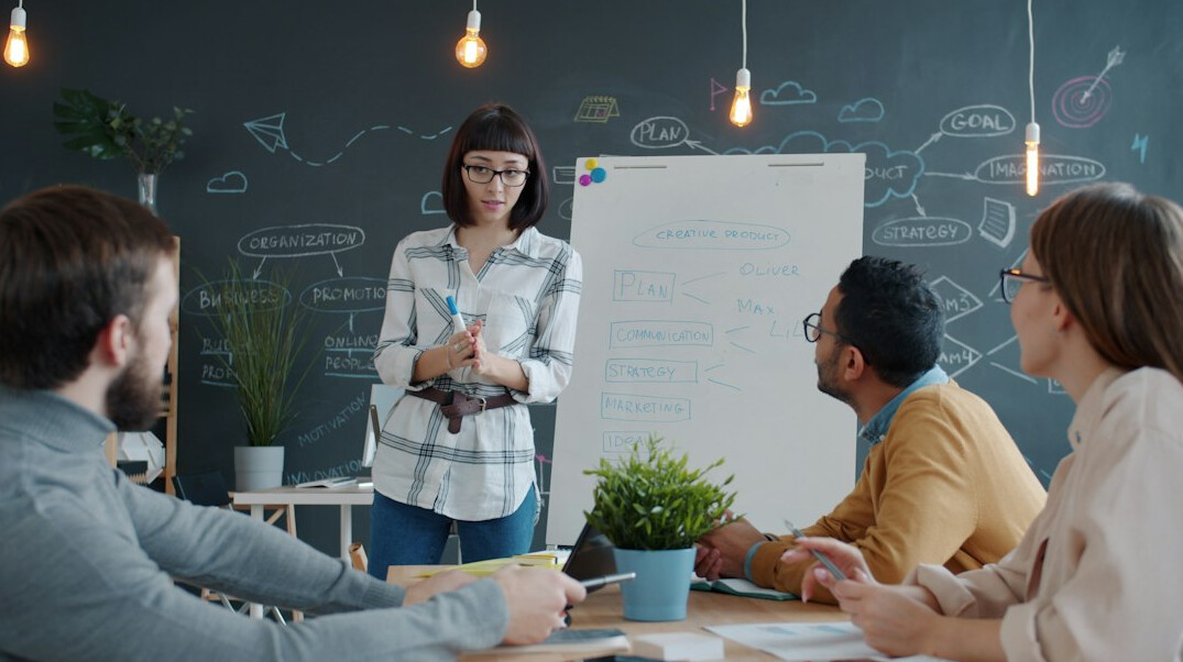 woman giving business presentation