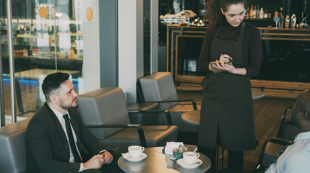 business people negotiating at table
