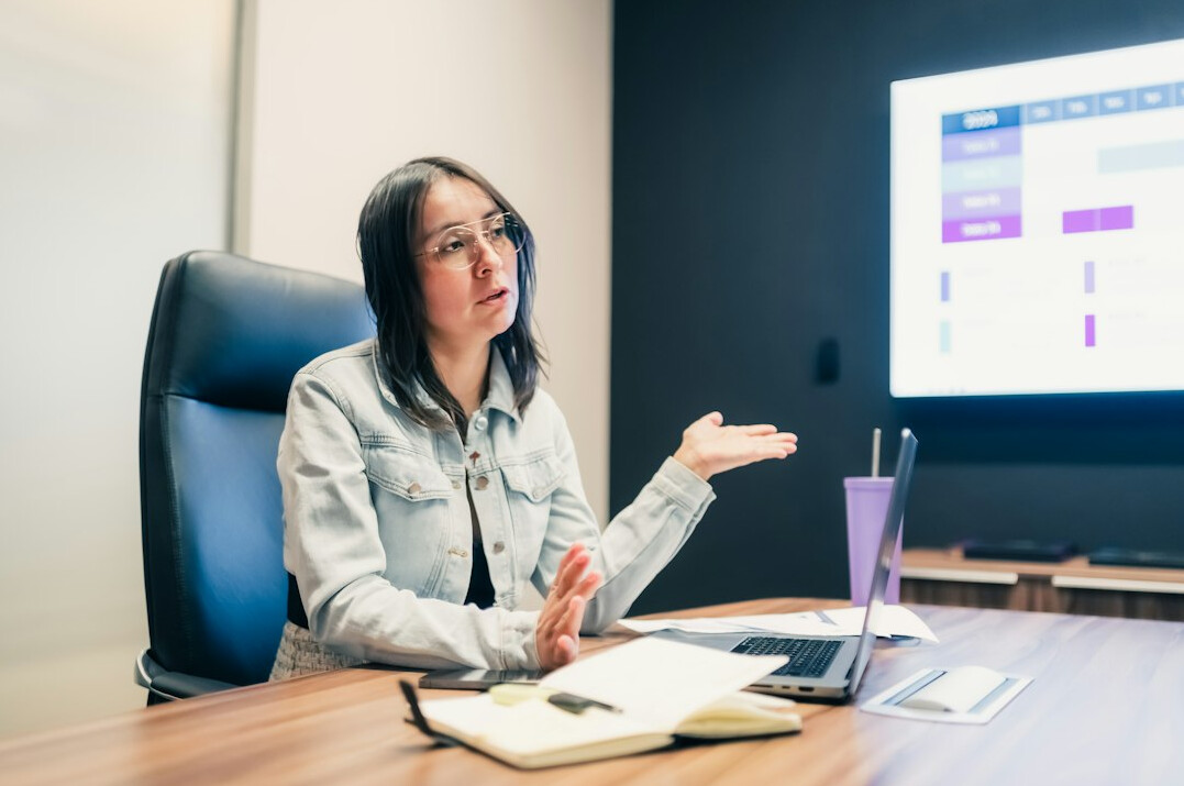 woman giving business presentation