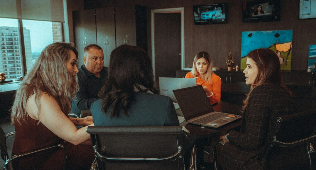 woman leading team meeting