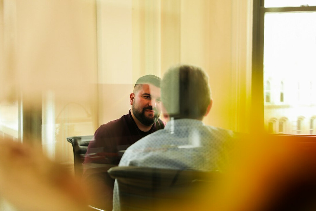 person listening in meeting